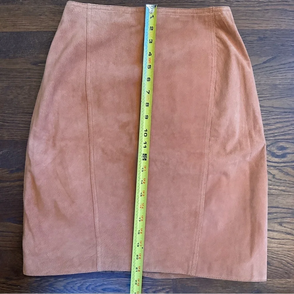 True vintage suede—real leather with clean tailoring an earlier designer era.
